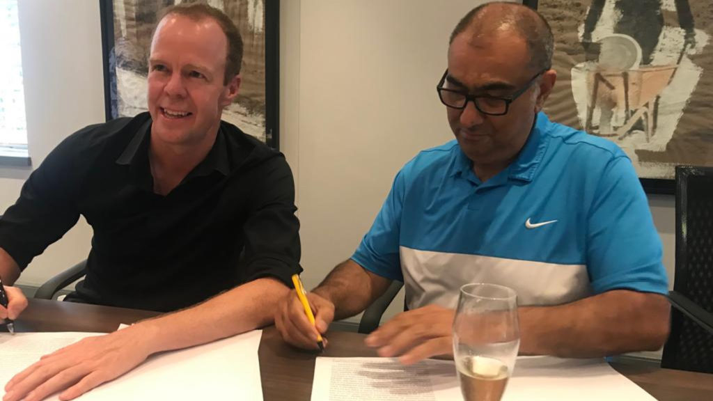Featured image, left to right: Savant CEO Nick Allen and SA SME Fund CEO Ketso signing the deal yesterday ( Supplied, Savant)