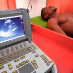 Featured image: A patient undergoing sonography at one of MDaaS diagnostic facilities (Supplied)