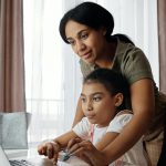 https://www.pexels.com/photo/mother-helping-her-daughter-use-a-laptop-4260325/