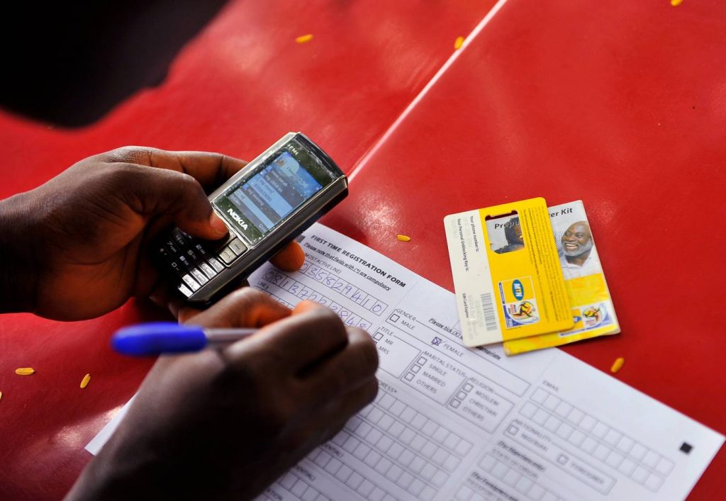 A man registers a SIM card as he attends to customers at a makeshift SIM card registration centre in Nigeria's capital Abuja August 3, 2010. REUTERS/Afolabi Sotunde Image Caption and Rights Information. Photo: Supplied/Ventureburn