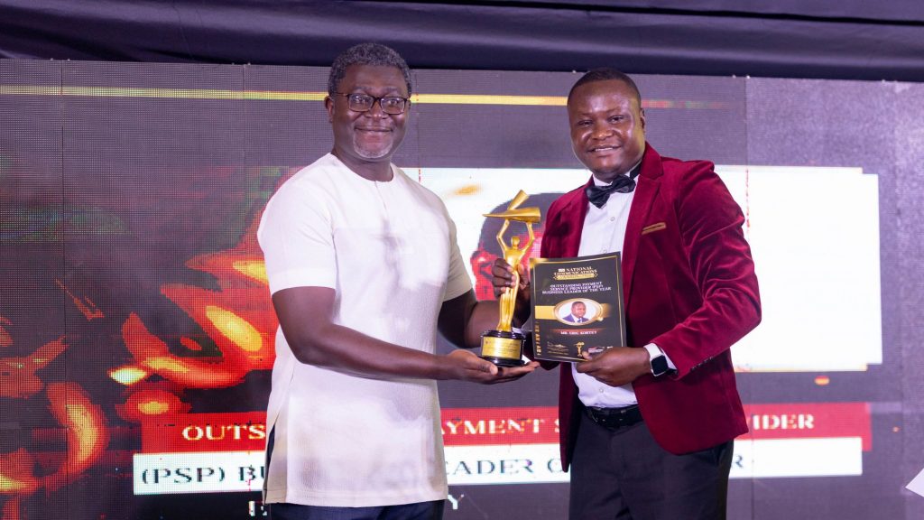 Ebo Richardson, board member for Inivare, celebrating with Eric Kortey, Ghana country manager for Cellulant, at the recent National Communications Awards. Photo: Supplied/Ventureburn