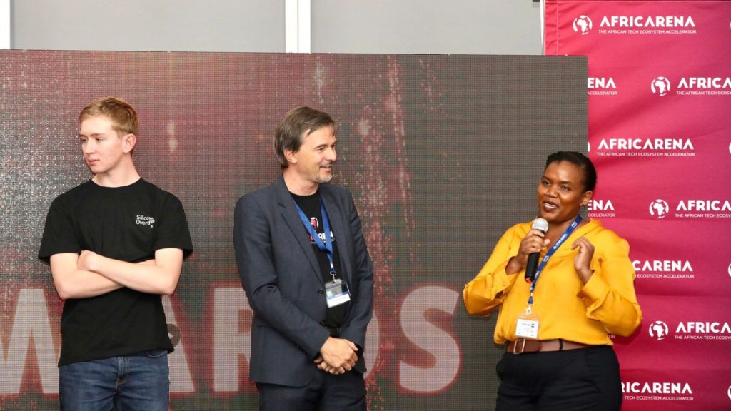 Karen Serem Waithaka, investment principal of The Catalyst Fund, recognised as the most attractive investor at AfricArena, shares her excitement and gratitude in a heartfelt speech. AfricArena CEO and founder Christophe Viarnaud listens attentively. Photo: Supplied/AfricArena