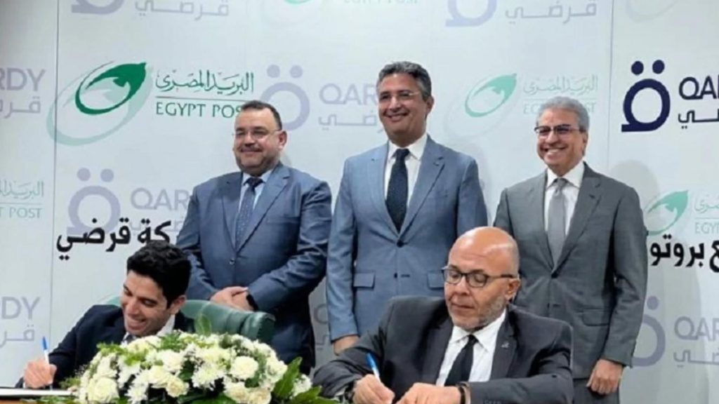 Dr Sherif Farouk, Egypt Post chairman, and Abdel Aziz Abdel Nabi, Qardy’s founder, celebrate the partnership agreement set to revolutionise SME financing in Egypt. Photo: Supplied