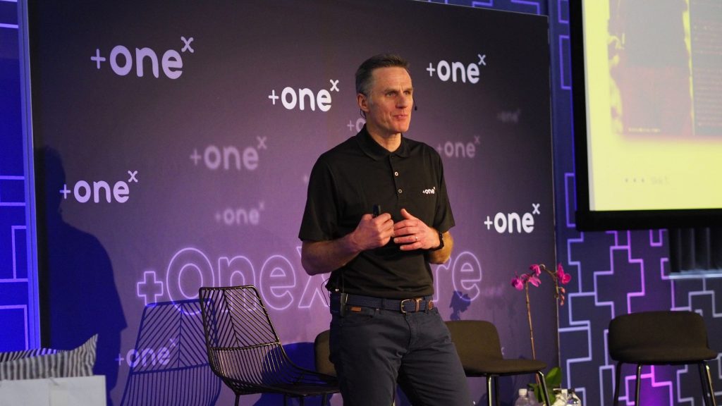+OneX: CEO Rob Godlonton addressing attendees at a +OneXplore event, sharing +OneX’s growth story and ambitious vision for becoming South Africa’s leading digital transformation partner. Photo: Supplied