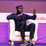 Nigeria minister of communications, innovation, and digital economy, Dr Bosun Tijani, addressing TechCabal’s Moonshot Conference. Photo: Supplied