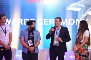 Bilel Gassara, founder and CEO of Hyo-Tec, delivers his acceptance speech after clinching the Most Innovative Business Model Award at the AfricArena Tunisia Summit. Photo: Supplied/VIP Services